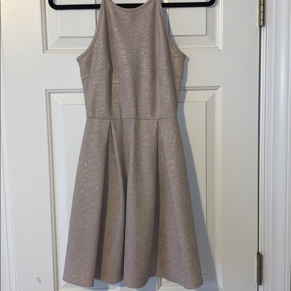 Gold pleated halter dress.